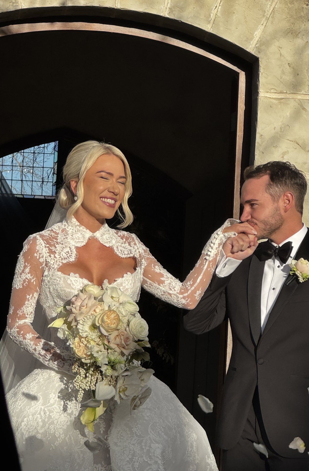 Romantic moment between Emma and Fletcher after their Coldstream wedding ceremony